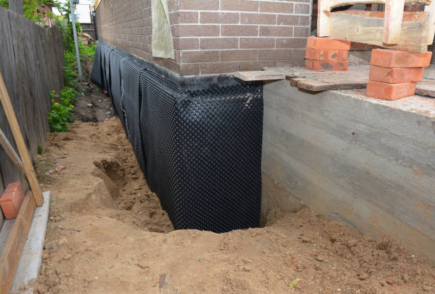 Happy homeowners after waterproofing job in Convoy